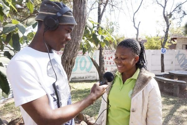 Waterberg Wave reporter interviewing a WWS staff member